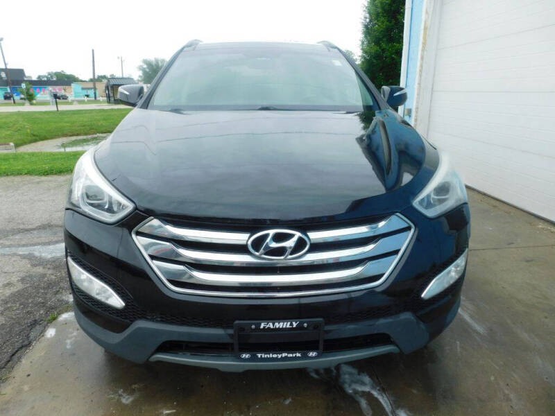 hyundai santa fe 2014 5XYZWDLA5EG136899 image hyundai santa fe 2014 5XYZWDLA5EG136899 image